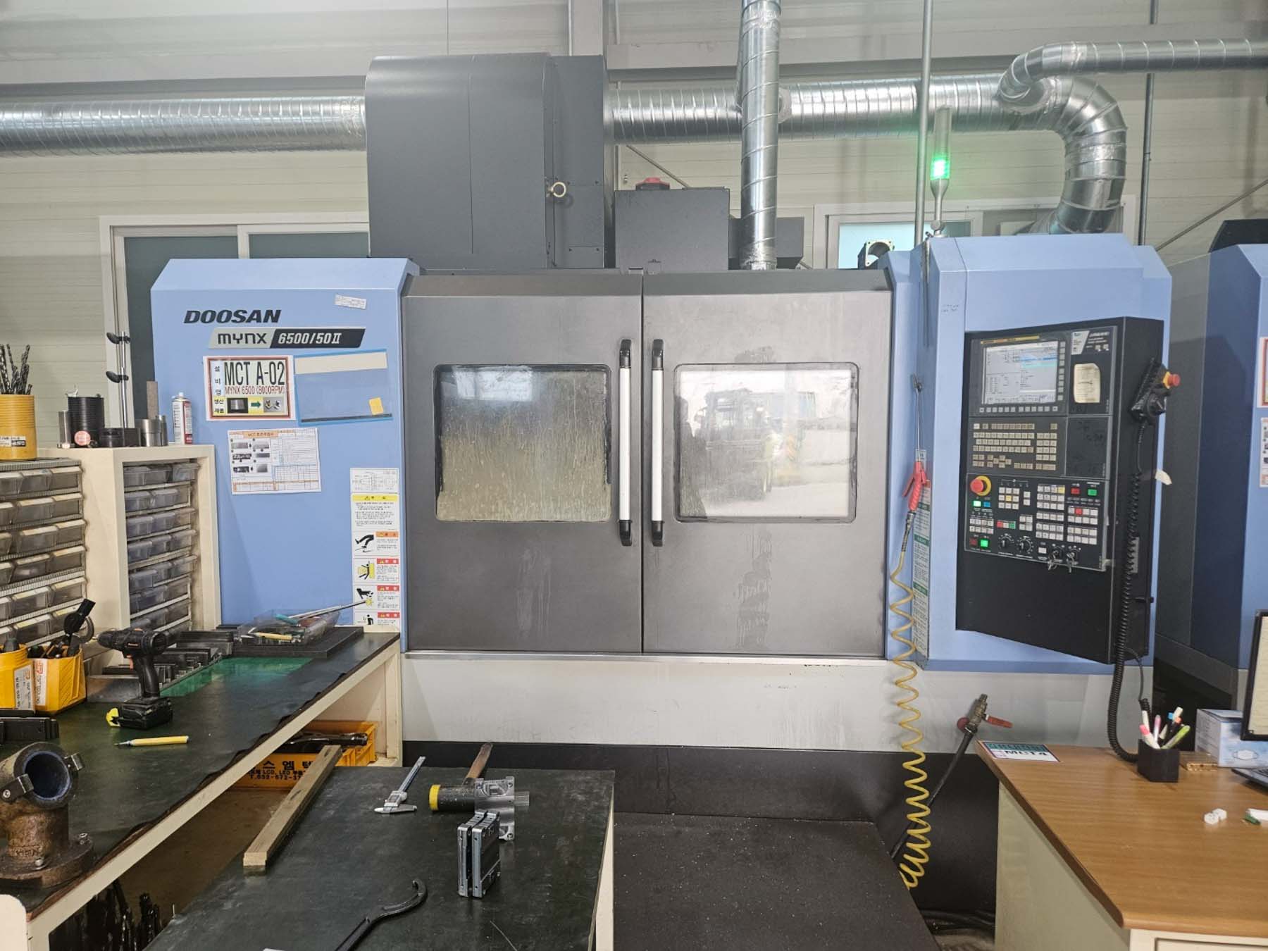 DOOSAN DN SOLUTIONS MYNX 6500 / 50II Vertical machining center (2020) id11312
